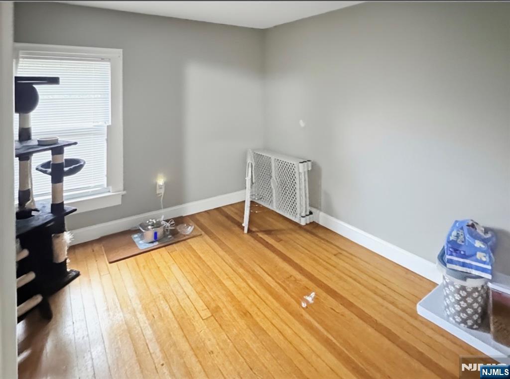 68 Washington Avenue Rutherford, NJ 07070 - Photo 13 of 23 a view of a room with wooden floor