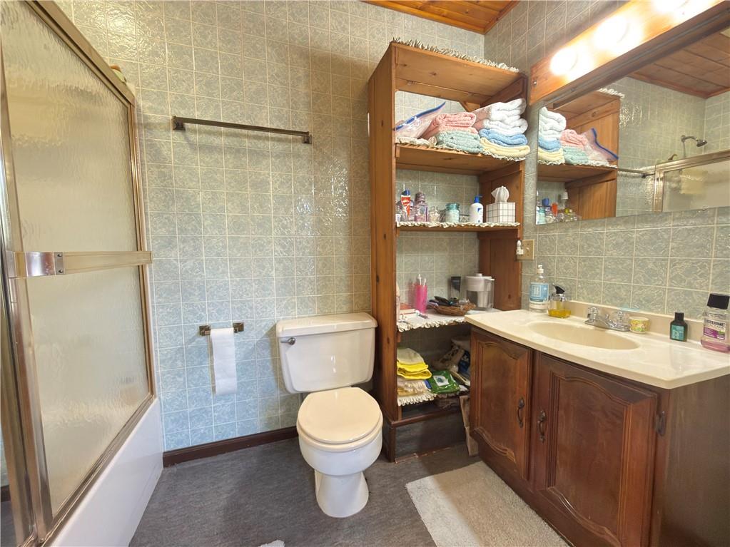 122 Coal Bank Road Greenville, PA 16125 - Photo 42 of 50 a bathroom with a sink a toilet and shower