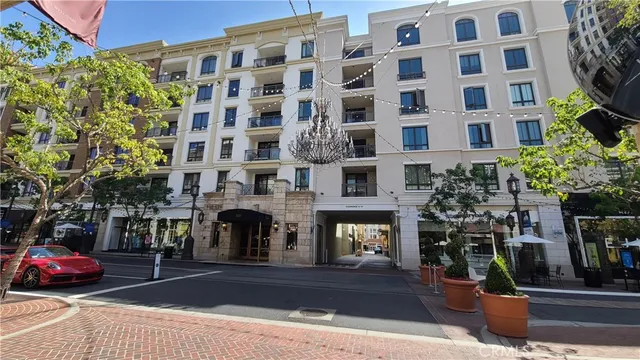 a front view of a building with street view