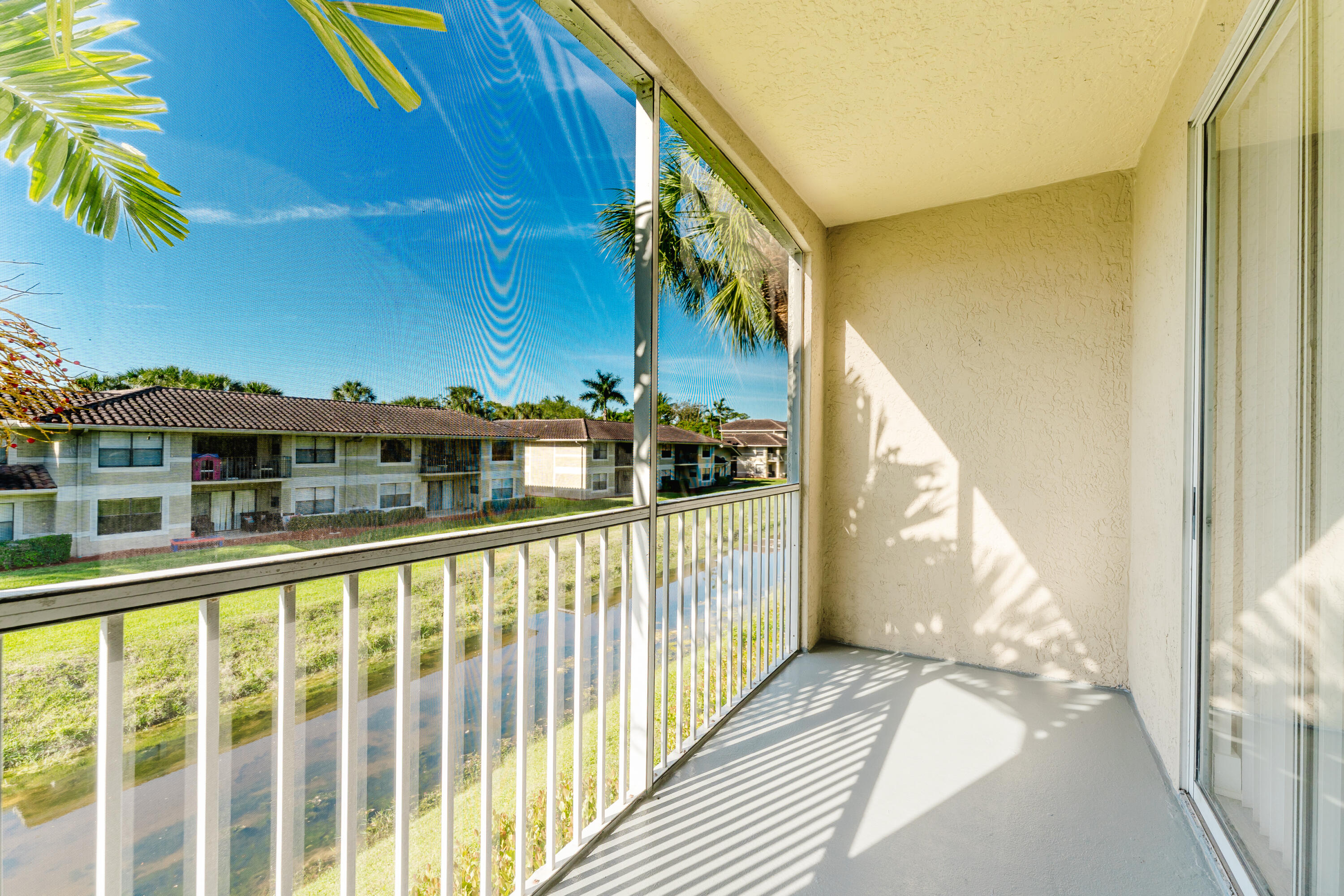 20889 St Andrews Boulevard Boca Raton, FL 33433 - Photo 14 of 46 a view of city from a balcony