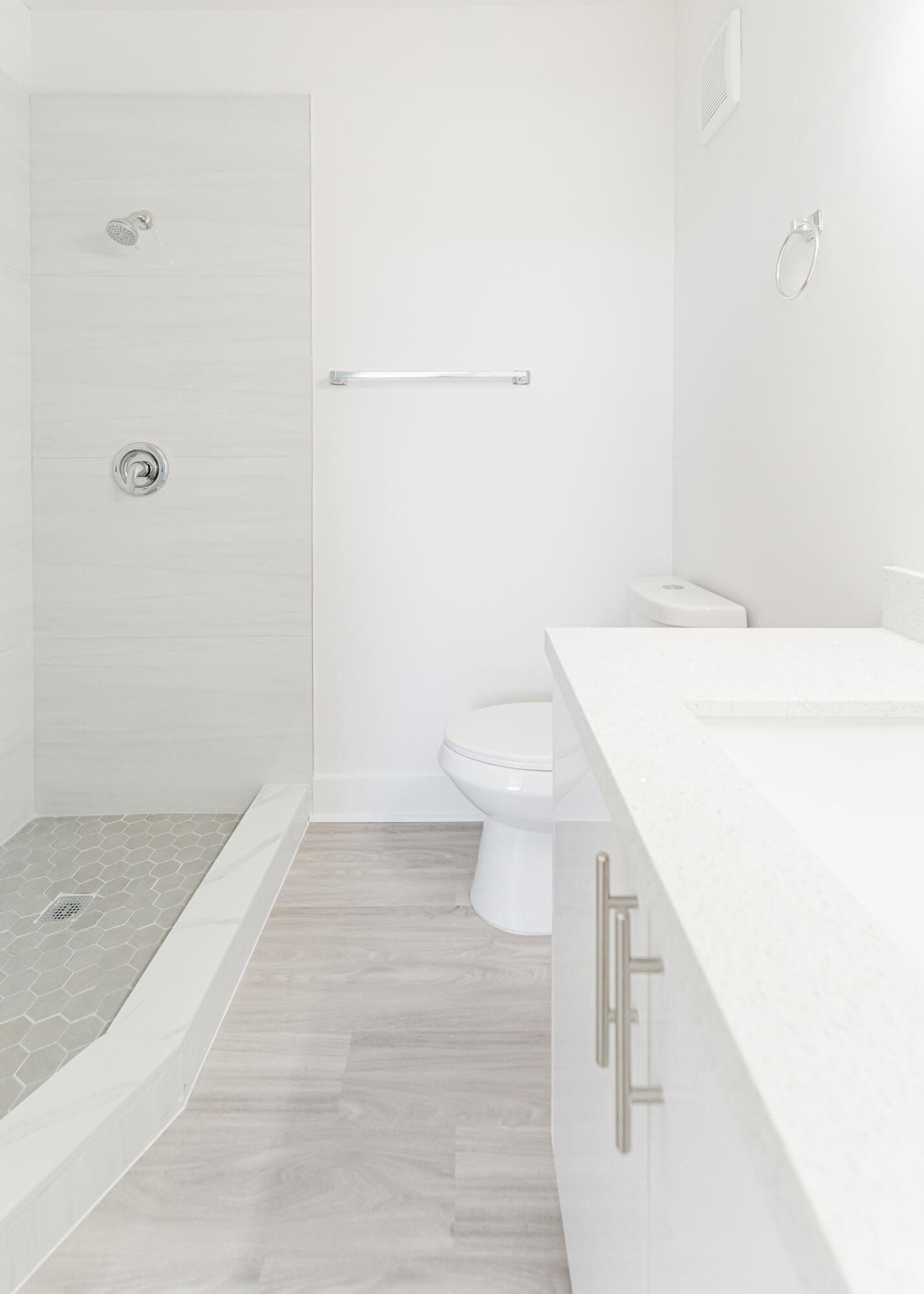 20889 St Andrews Boulevard Boca Raton, FL 33433 - Photo 24 of 46 a bathroom with a sink a toilet and shower