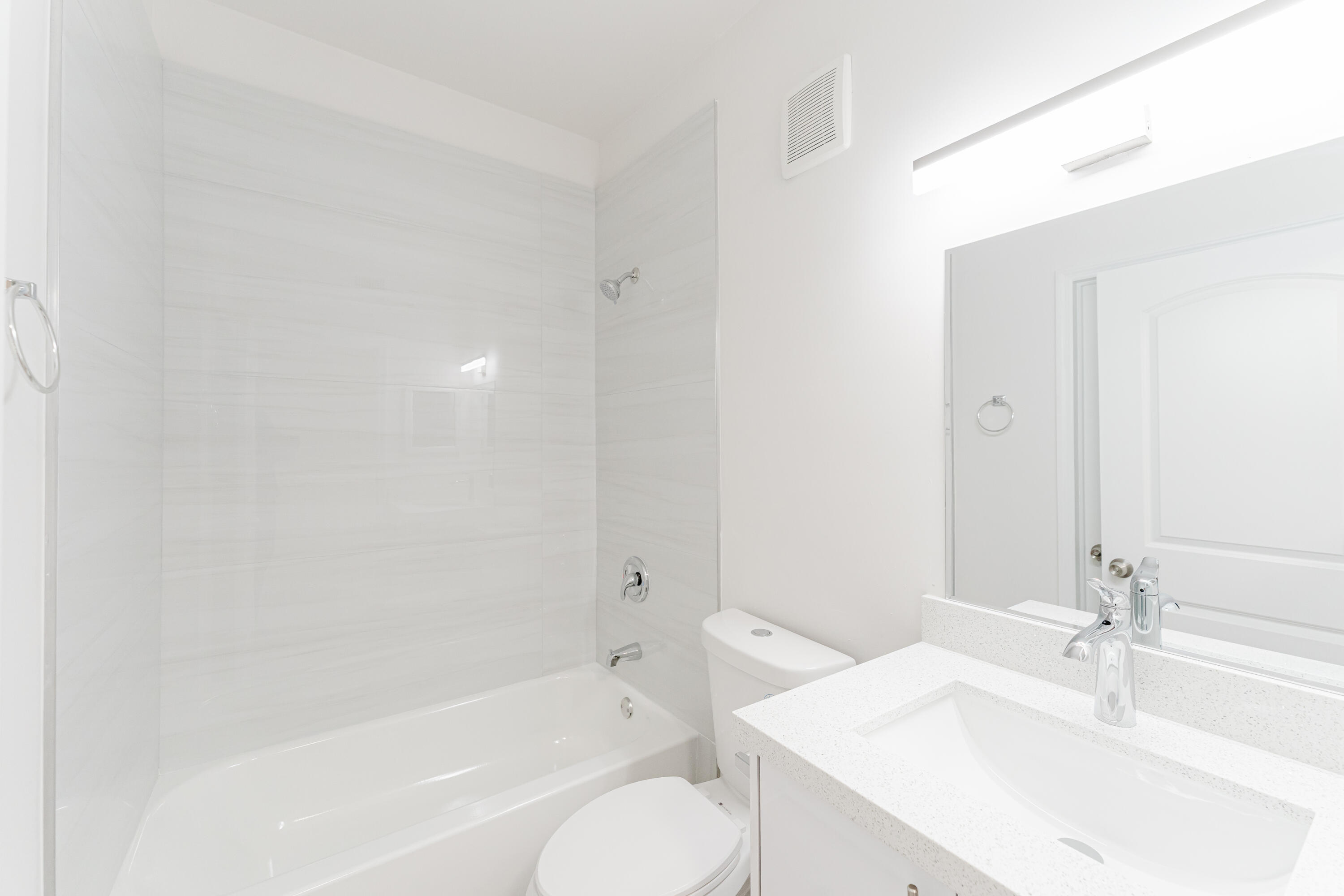 20889 St Andrews Boulevard Boca Raton, FL 33433 - Photo 25 of 46 a bathroom with a sink toilet and bathtub