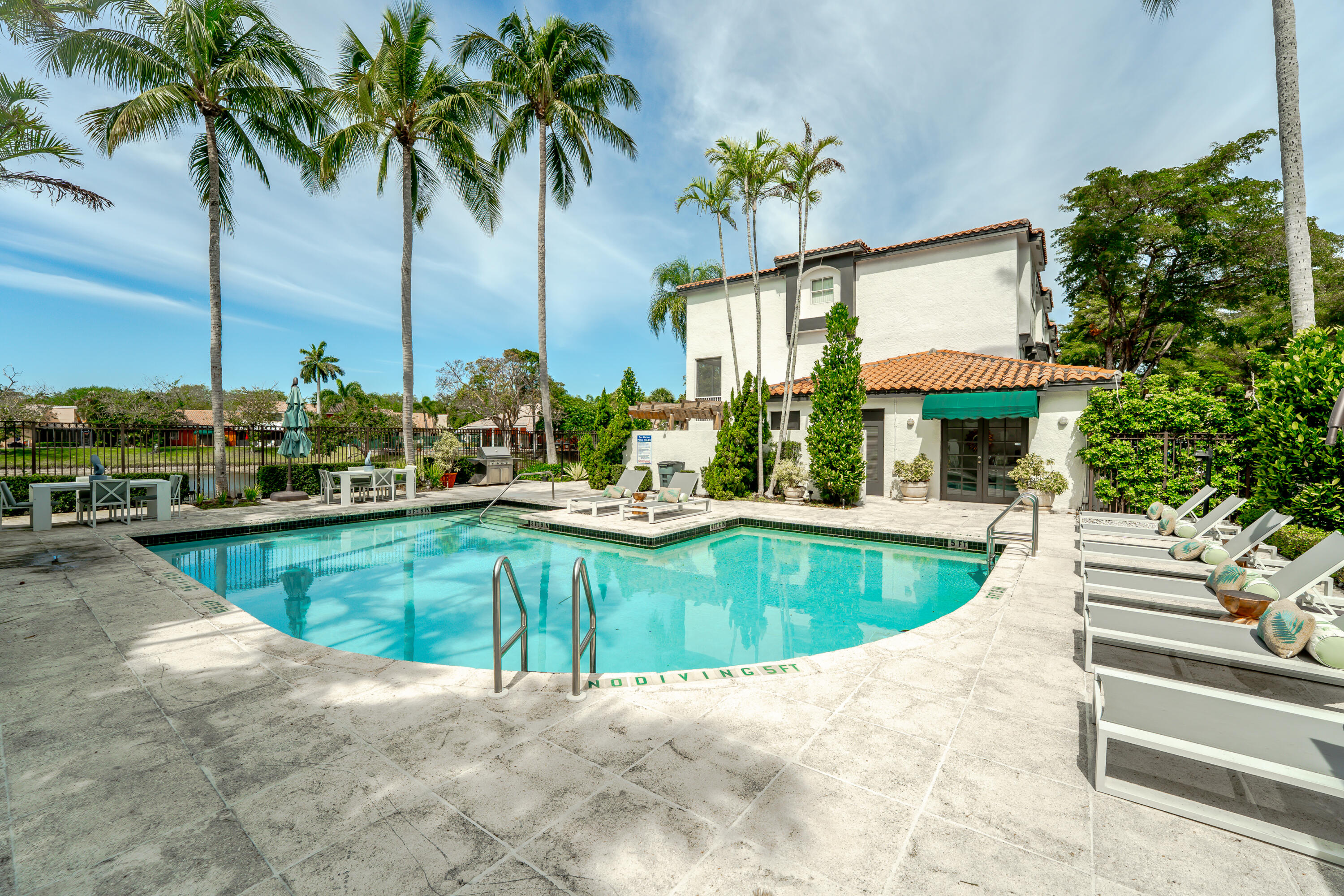 20889 St Andrews Boulevard Boca Raton, FL 33433 - Photo 41 of 46 a view of a house with swimming pool