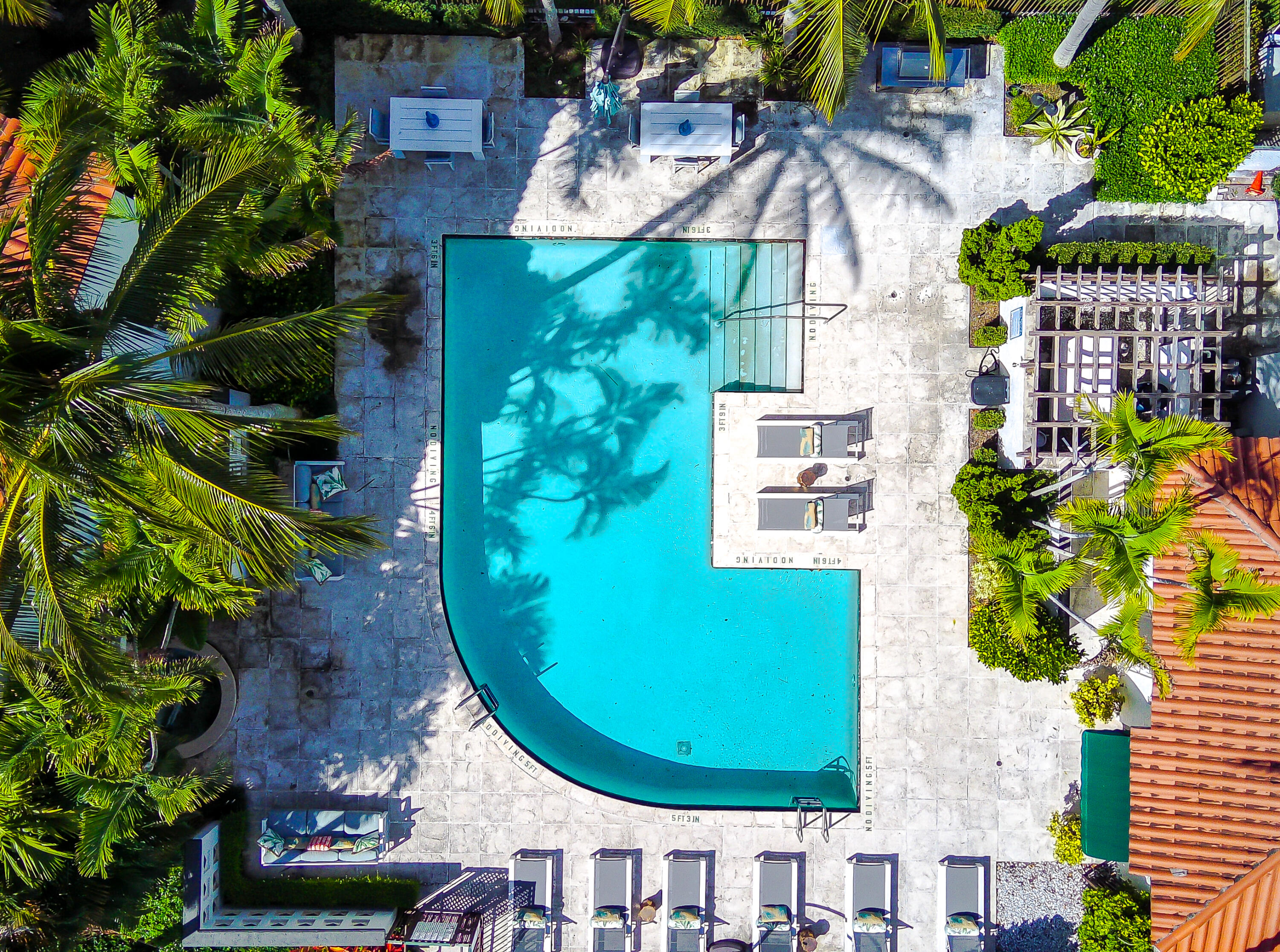 20889 St Andrews Boulevard Boca Raton, FL 33433 - Photo 43 of 46 an aerial view of a house with a swimming pool