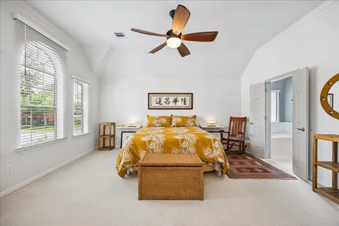 a bed room with furniture and a window