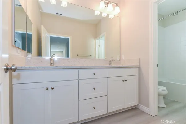 a aerial view of a house with a yard