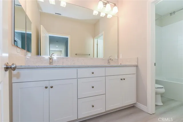 a aerial view of a house with a yard