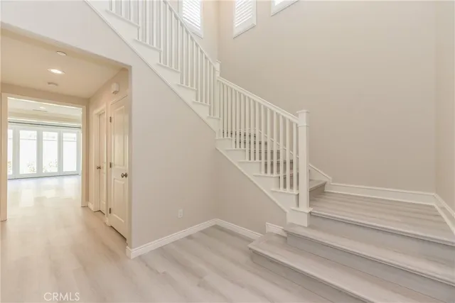 a view of staircase with white walls and white walls