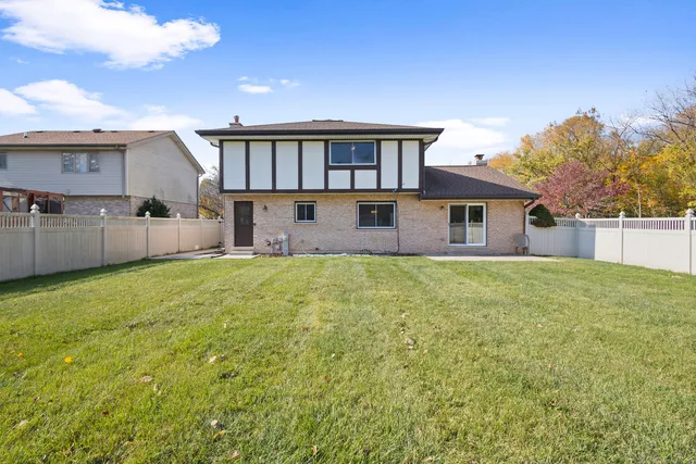 a house view with a garden space
