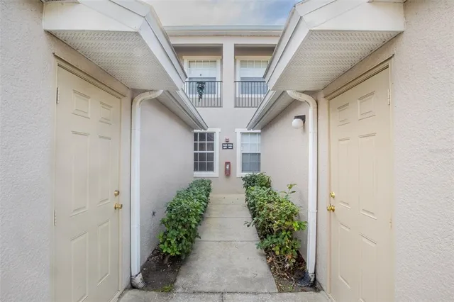 a view of entryway with flower pots