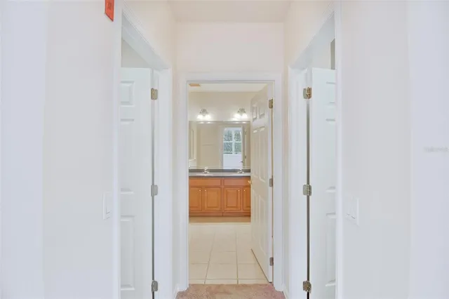 a view of a white house with a large windows