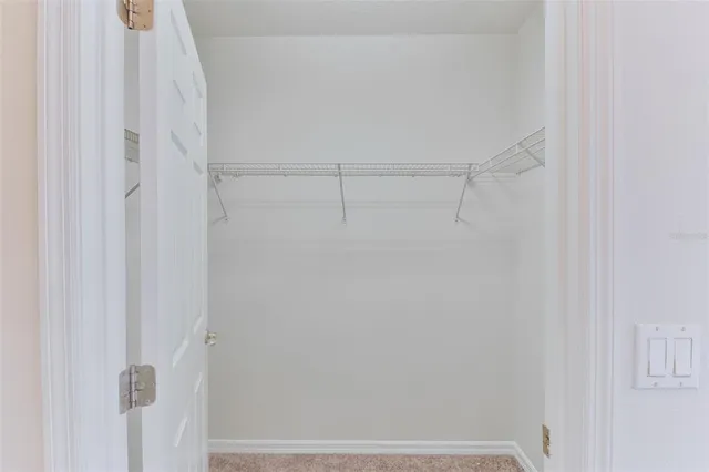 a view of small space with racks on the wall