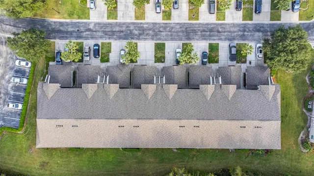 a view of a house with a tub and a bench