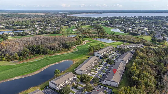 an aerial view of a city with lots of residential buildings