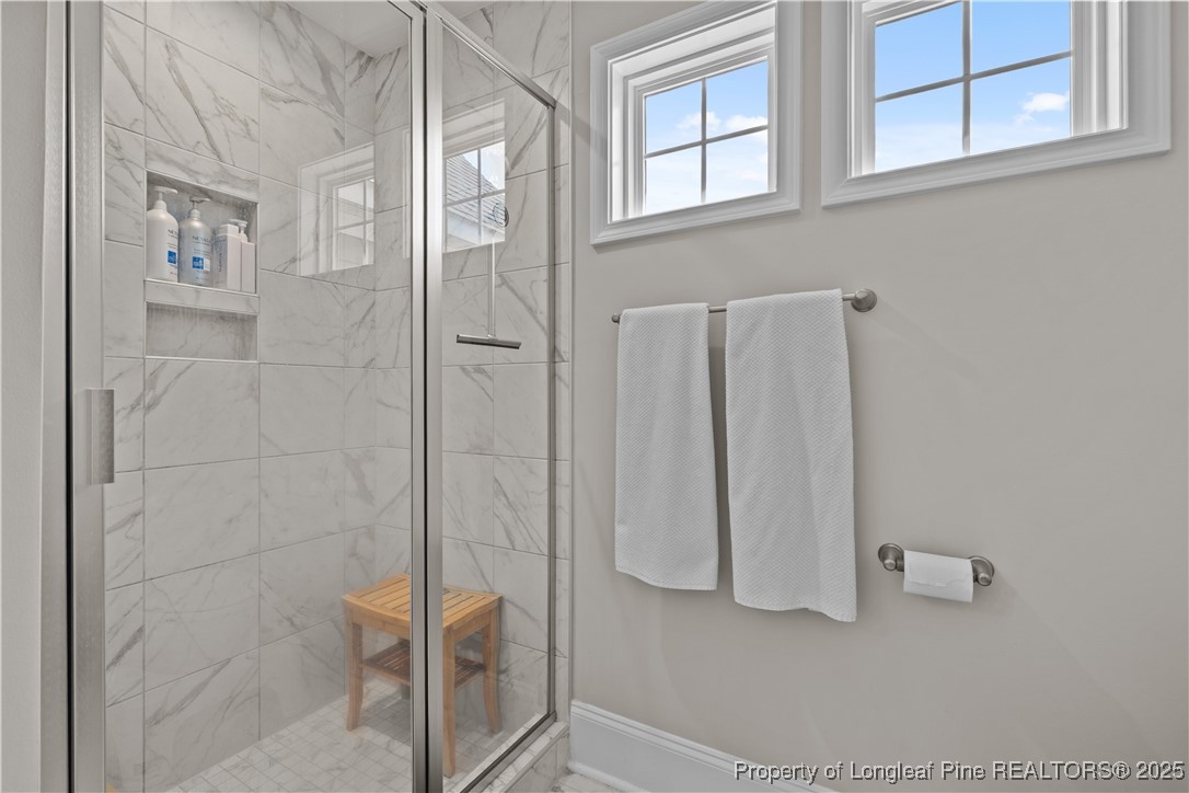 479 Kerr Lake Road Aberdeen, NC 28315 - Photo 20 of 43 a bathroom with a shower