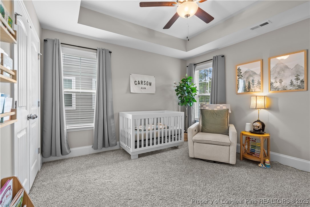 479 Kerr Lake Road Aberdeen, NC 28315 - Photo 21 of 43 a view of a livingroom with furniture and windows