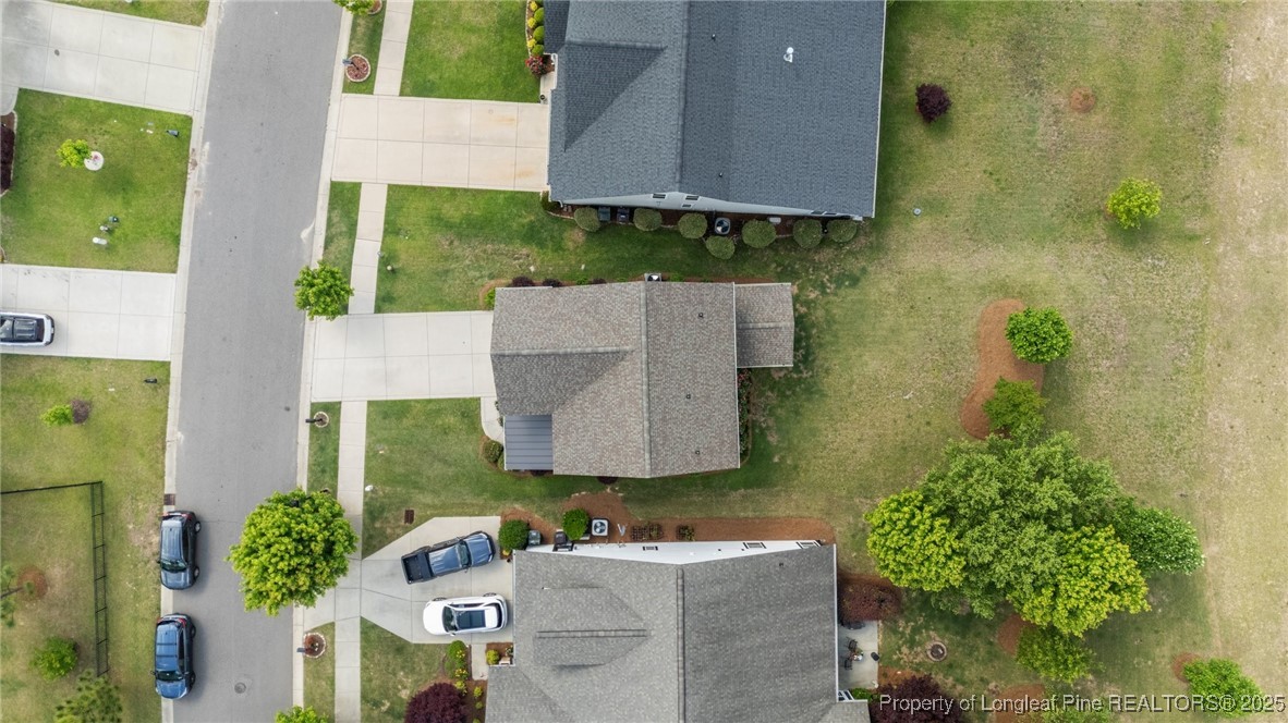 479 Kerr Lake Road Aberdeen, NC 28315 - Photo 36 of 43 aerial view of a house with a garden