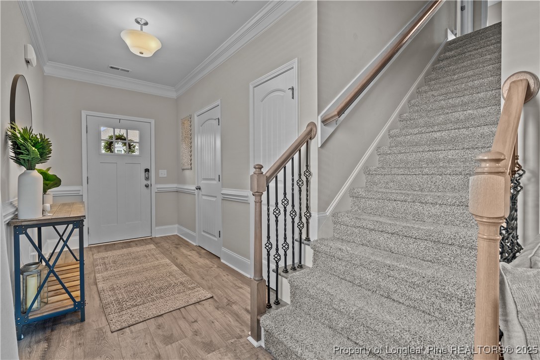 479 Kerr Lake Road Aberdeen, NC 28315 - Photo 5 of 43 a view of an entryway with wooden floor