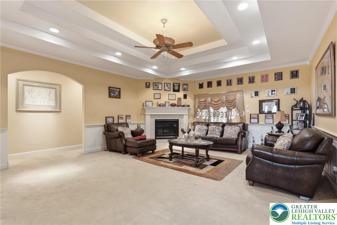 5217 Cider Press Road Schnecksville, PA 18078 - Photo 8 of 54 a living room with furniture and a fireplace