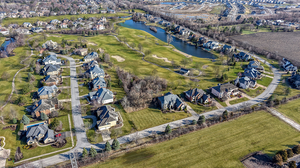 115 Ruffled Feathers Drive Lemont, IL 60439 - Photo 5 of 26 an aerial view of residential houses with outdoor space