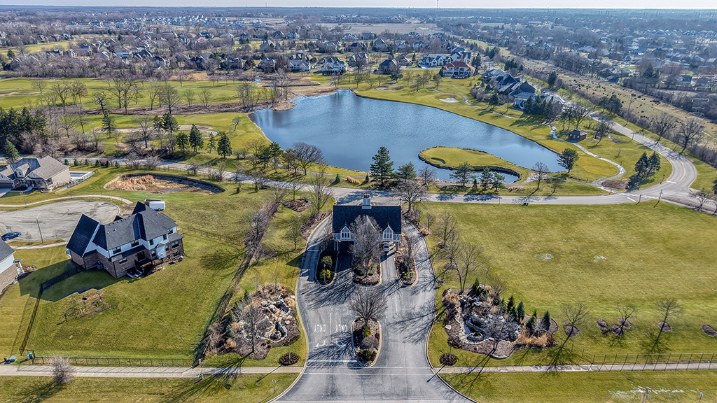 115 Ruffled Feathers Drive Lemont, IL 60439 - Photo 9 of 26 an aerial view of residential houses with outdoor space
