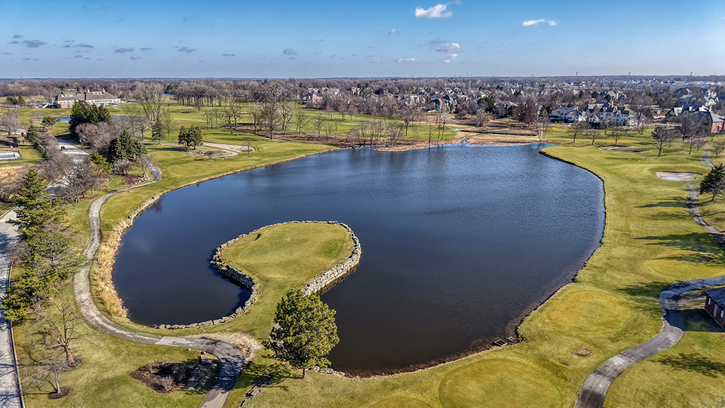 115 Ruffled Feathers Drive Lemont, IL 60439 - Photo 10 of 26 a view of a swimming pool with an outdoor space and seating area