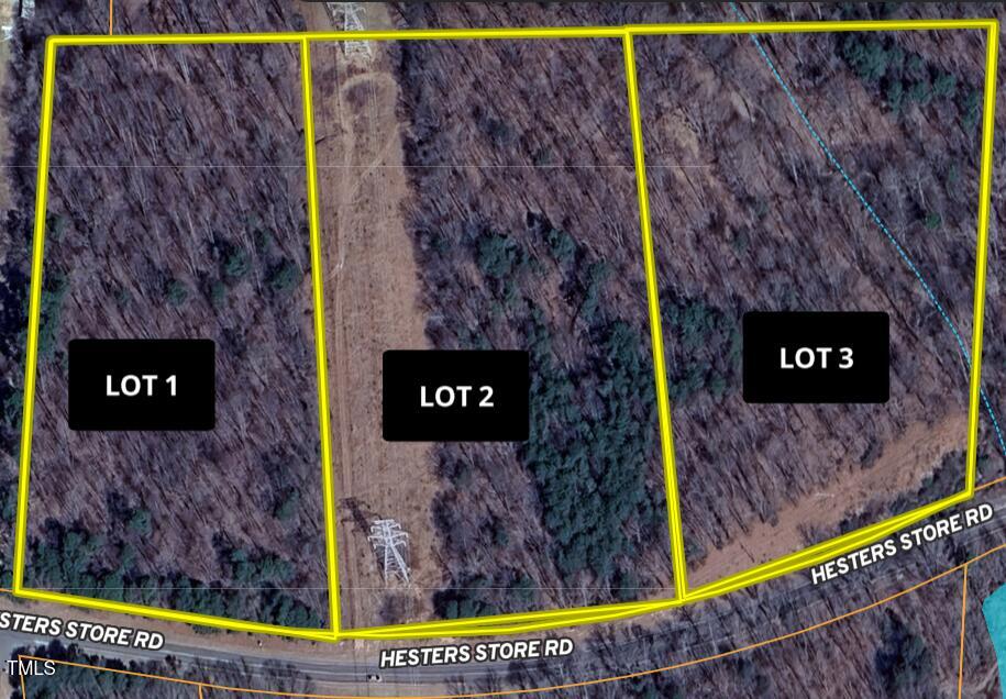 Lot 2 Hesters Store Road Roxboro, NC 27574 - Photo 2 of 11 a sign that is on a brick wall