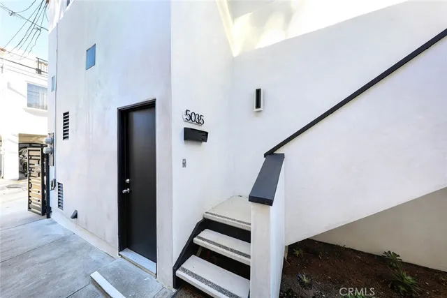 a view of an entryway with staircase