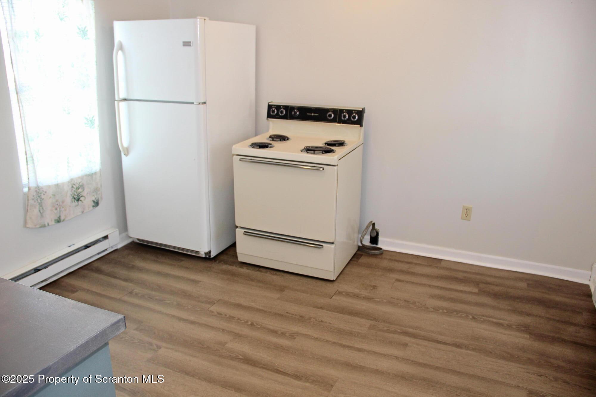 144 East Grace Street Old Forge, PA 18518 - Photo 12 of 17 a view of a storage & utility room with washer and dryer