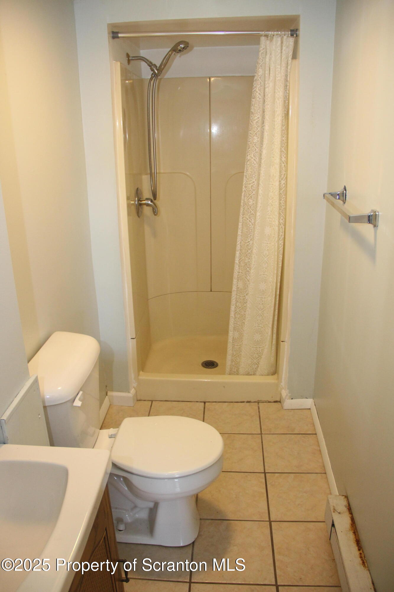 144 East Grace Street Old Forge, PA 18518 - Photo 16 of 17 a bathroom with a toilet and a shower