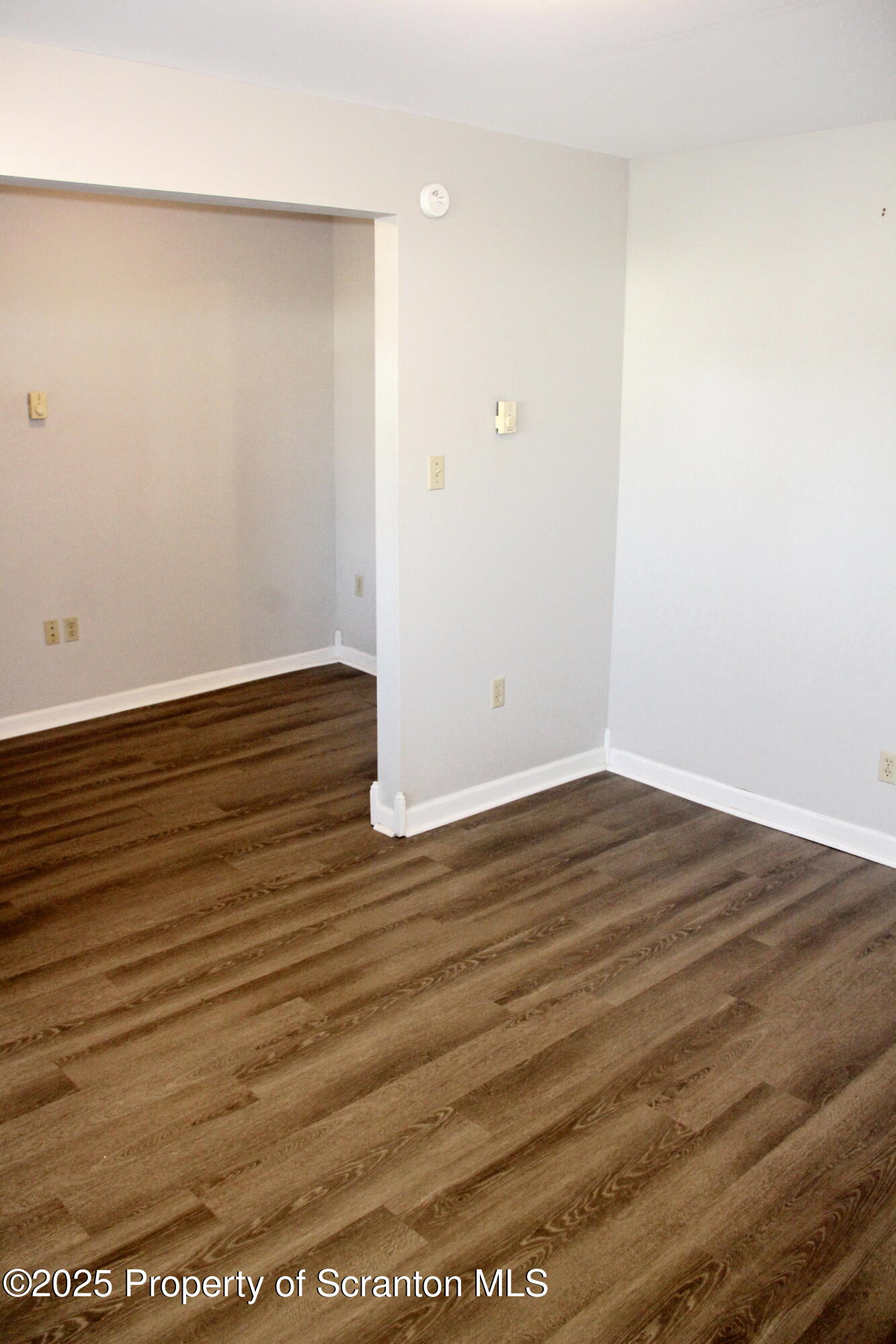144 East Grace Street Old Forge, PA 18518 - Photo 8 of 17 a view of room with wooden floor
