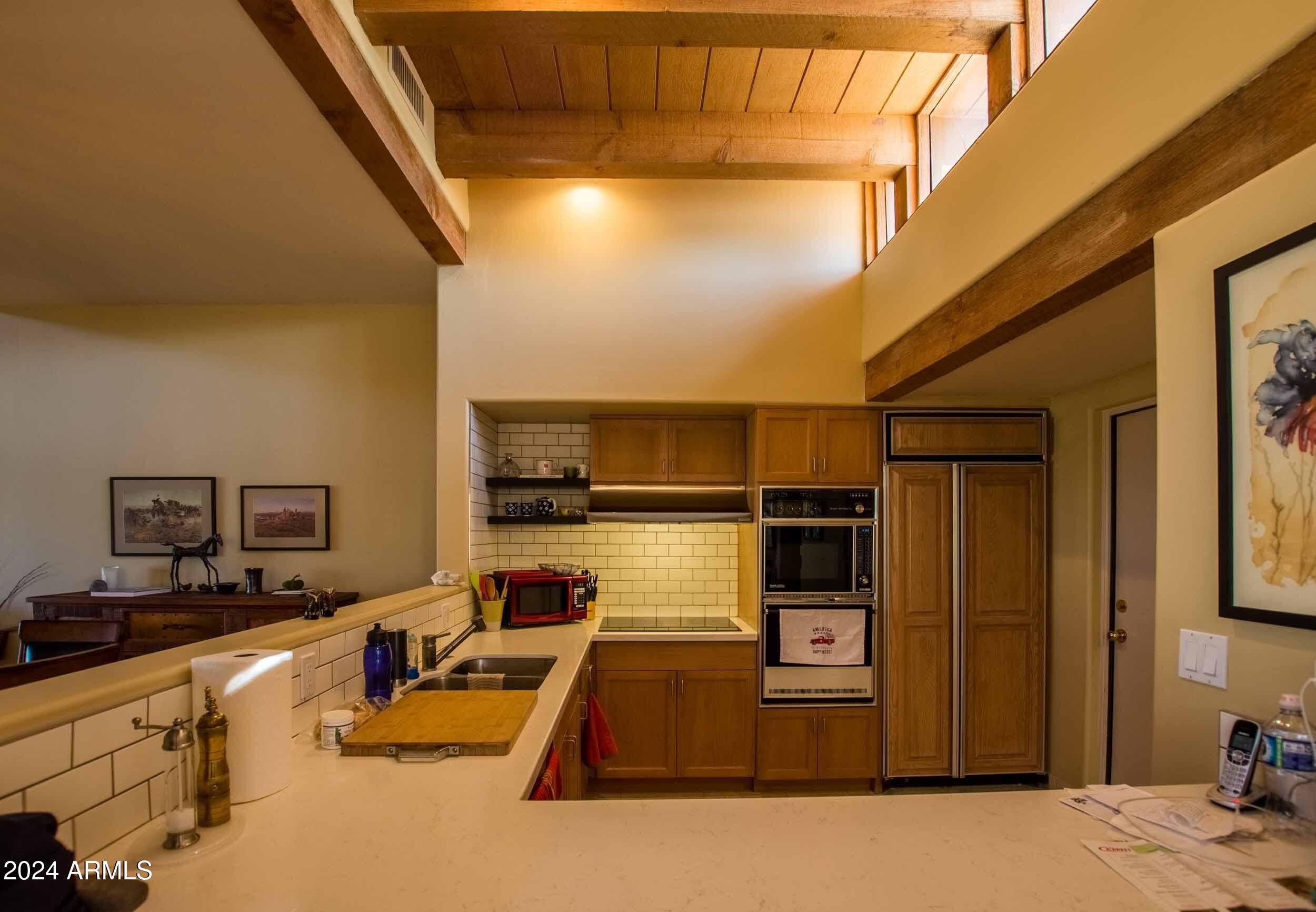 8502 East Cave Creek Road, Unit 10 Carefree, AZ 85377 - Photo 22 of 44 a picture of a living room with furniture