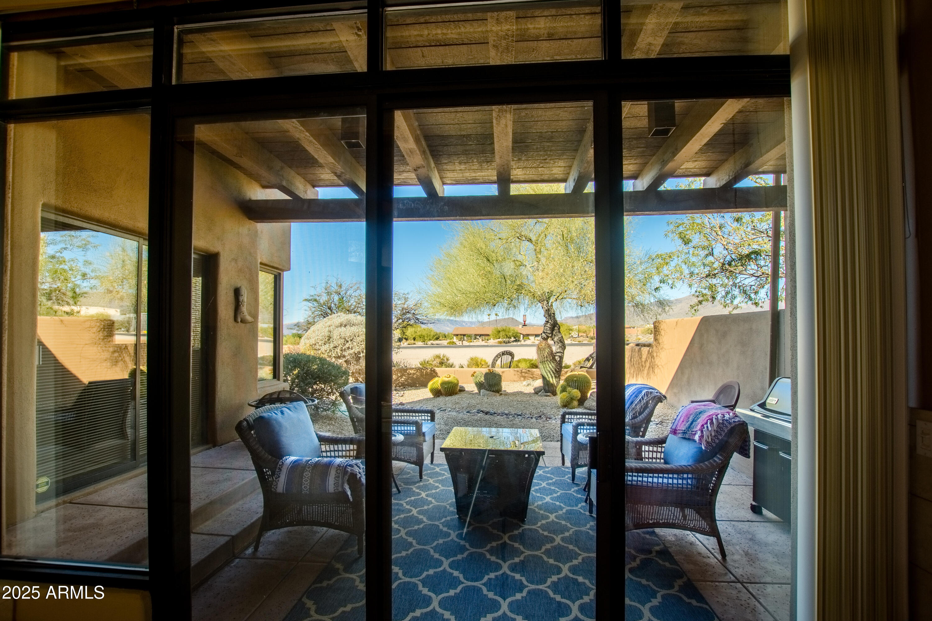 8502 East Cave Creek Road, Unit 10 Carefree, AZ 85377 - Photo 25 of 44 a view of a room with chairs and balcony