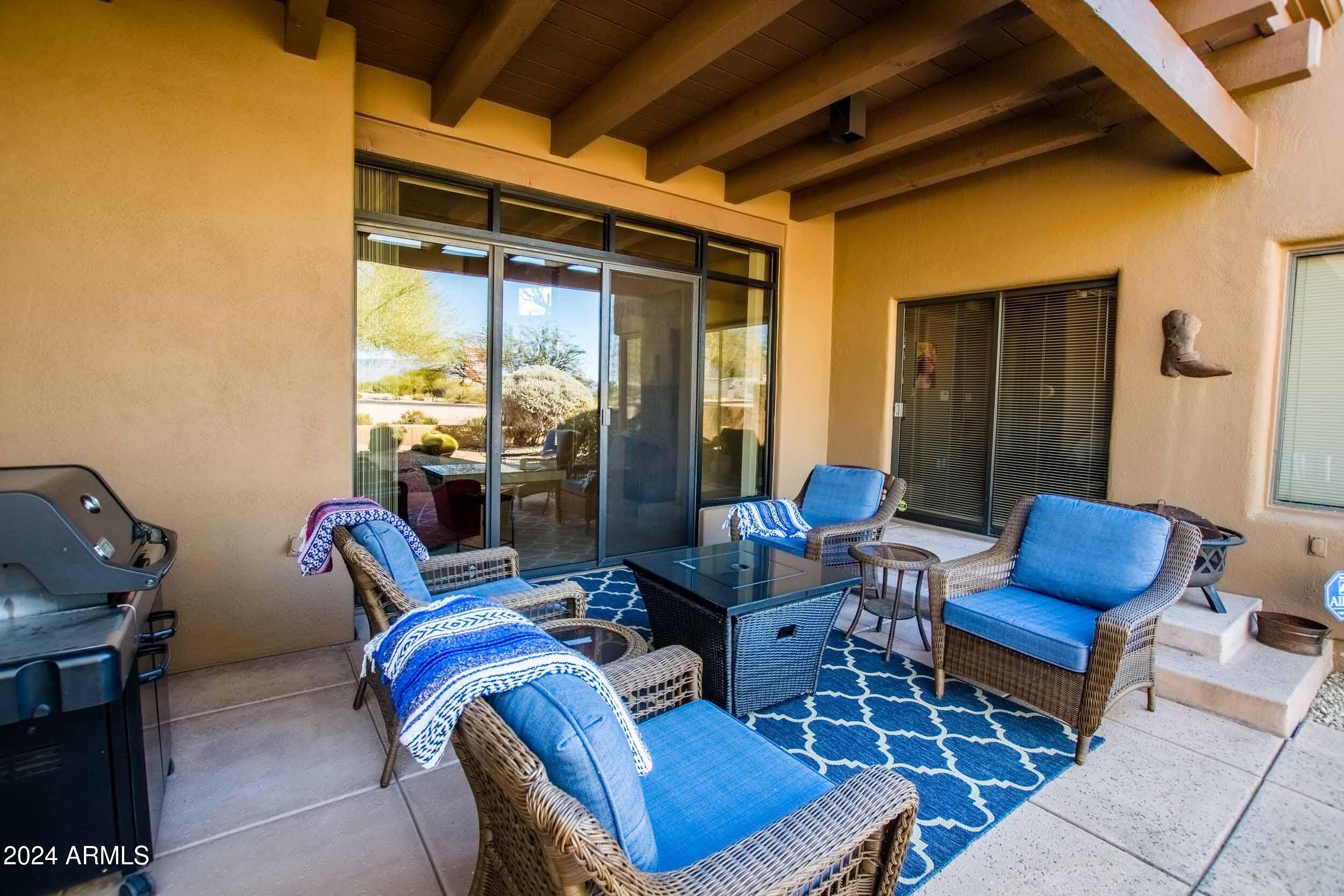 8502 East Cave Creek Road, Unit 10 Carefree, AZ 85377 - Photo 29 of 44 a outdoor living space with furniture