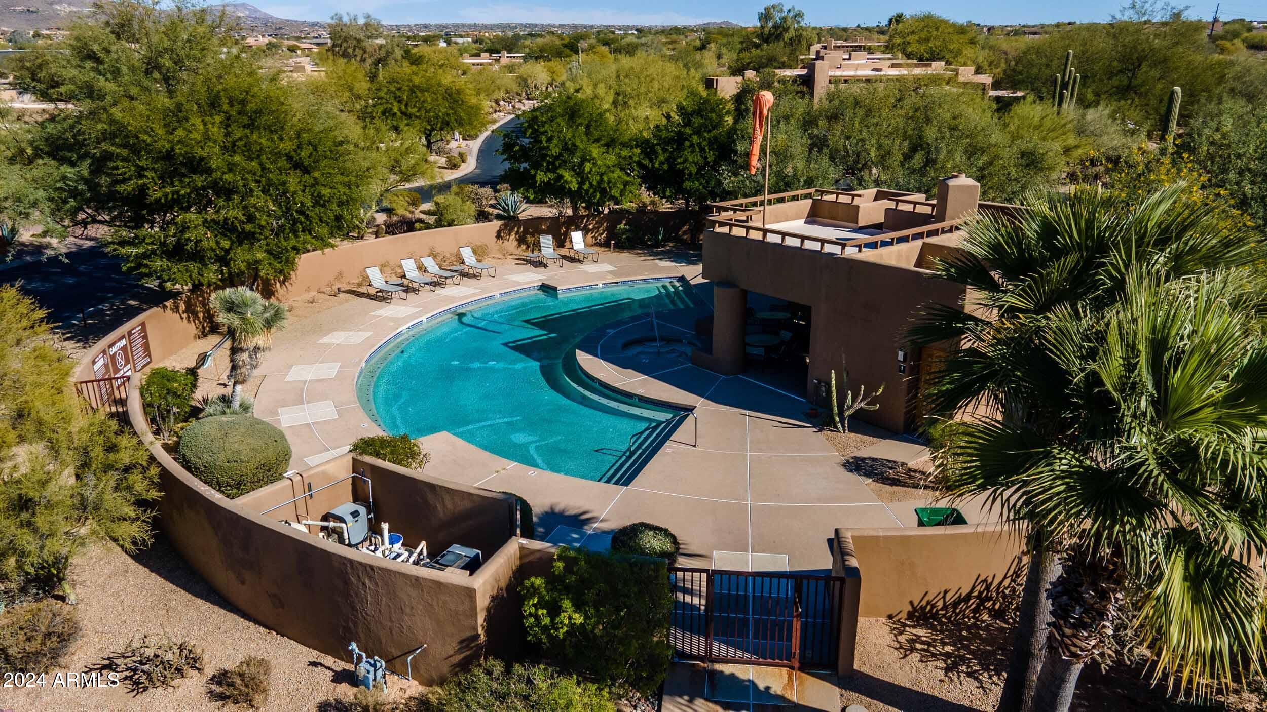 8502 East Cave Creek Road, Unit 10 Carefree, AZ 85377 - Photo 3 of 44 an aerial view of a house with outdoor space patio and swimming pool