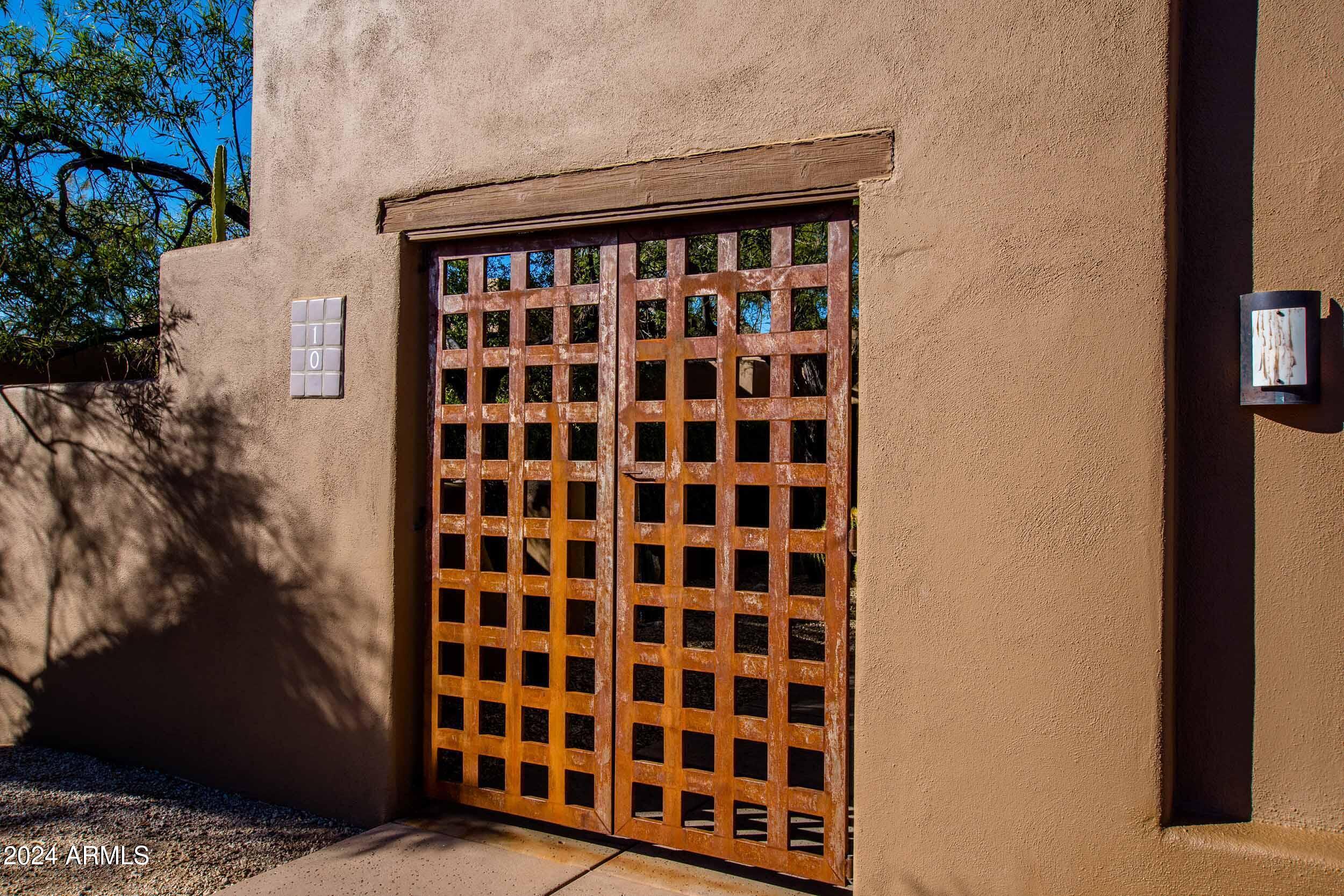 8502 East Cave Creek Road, Unit 10 Carefree, AZ 85377 - Photo 9 of 44 a view of a black and white wall
