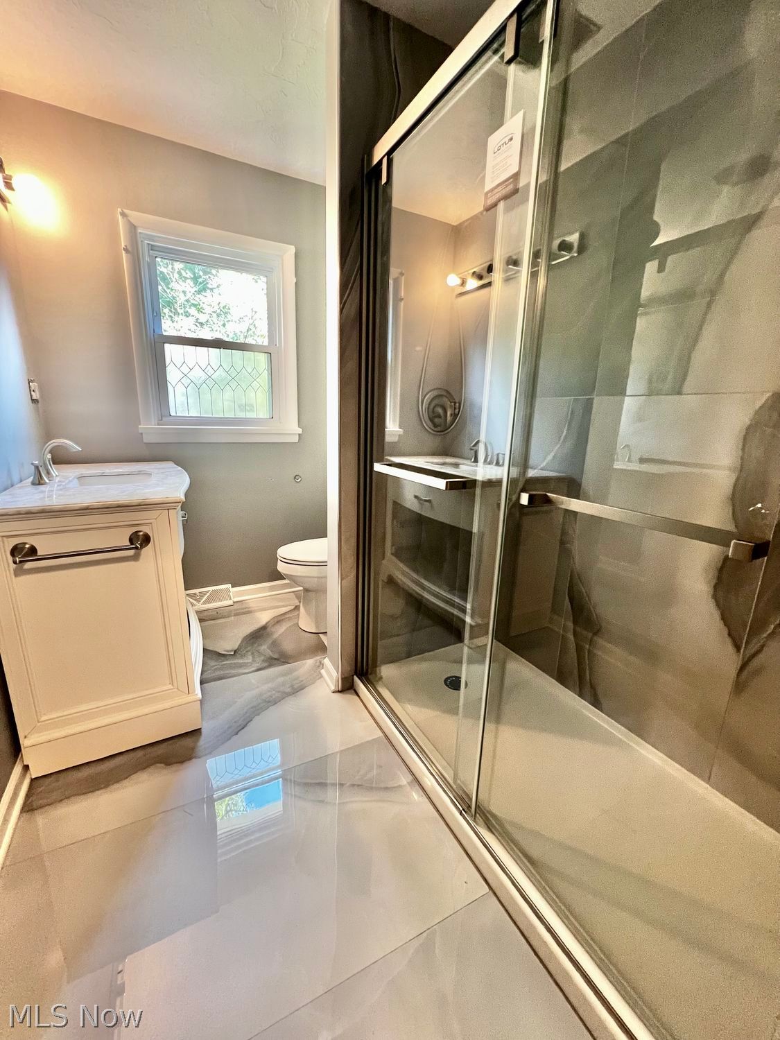 1123 Granger Road Medina, OH 44256 - Photo 25 of 31 Updated Bathroom w/ Marble Details and upgraded Vanity