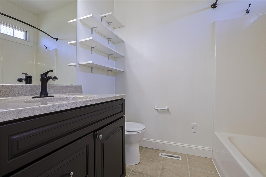 3681 Wilmington Road Lebanon, OH 45036 - Photo 31 of 87 This bathroom offers ample storage, a spacious vanity, and a refreshing shower and tub combination.