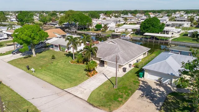 an aerial view of a house with a garden
