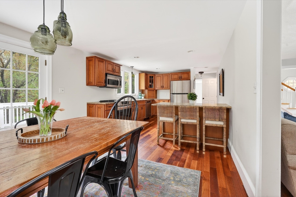 59 First Parish Road Norwell, MA 02061 - Photo 8 of 37 a view of a dining room with furniture and wooden floor