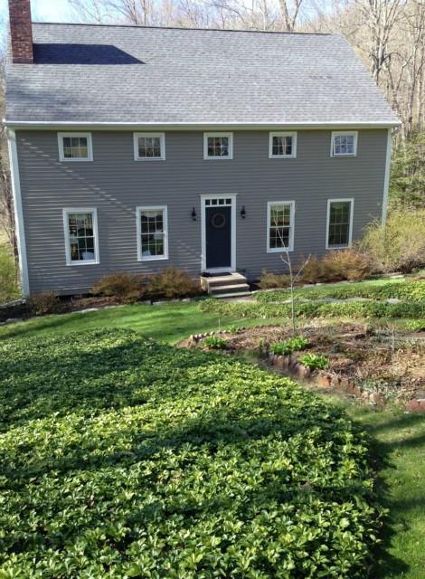 a backyard of a house with lots of green space