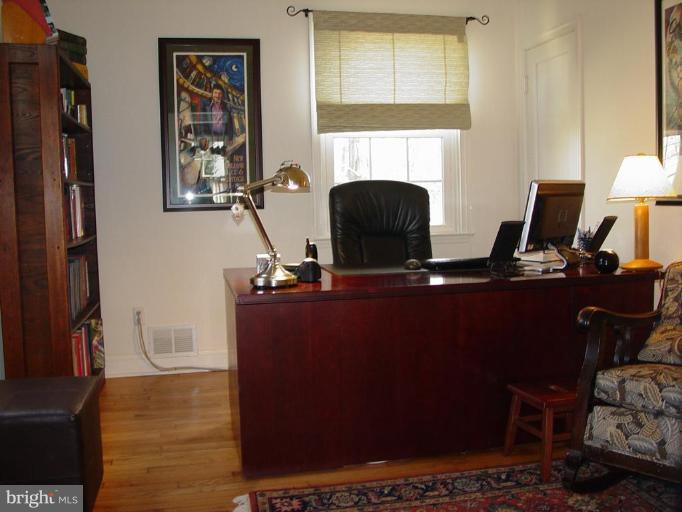 730 Overbrook Road Baltimore, MD 21212 - Photo 11 of 29 a view of workspace with wooden floor windows