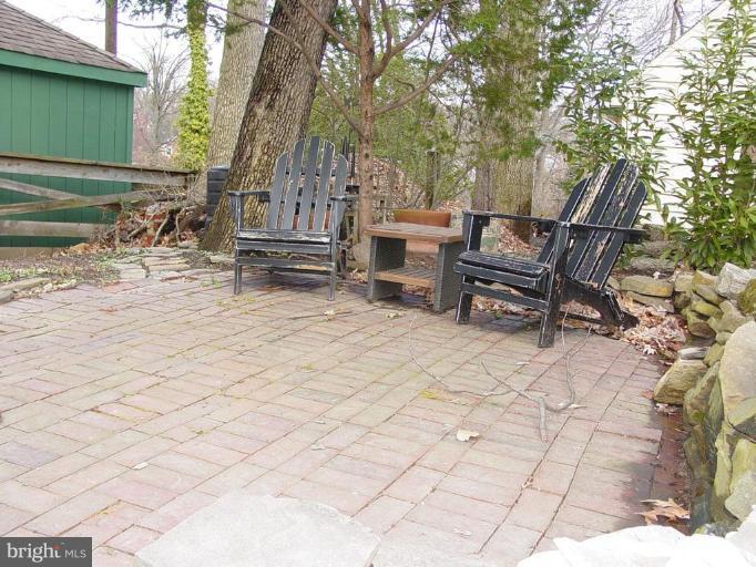 730 Overbrook Road Baltimore, MD 21212 - Photo 24 of 29 a view of backyard with a table and chairs