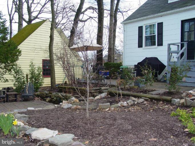 730 Overbrook Road Baltimore, MD 21212 - Photo 27 of 29 a front view of a house with garden