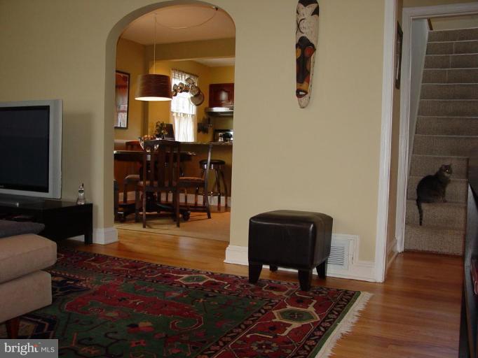 730 Overbrook Road Baltimore, MD 21212 - Photo 7 of 29 a living room with furniture and wooden floor