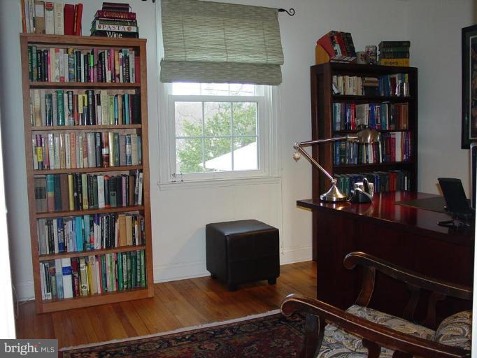 730 Overbrook Road Baltimore, MD 21212 - Photo 8 of 29 a room with bookshelf and a window