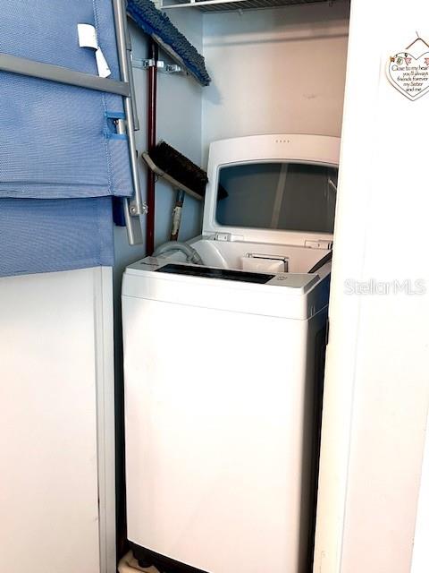 1701 Pinehurst Road, Unit 13C Dunedin, FL 34698 - Photo 12 of 28 a view of washer and dryer