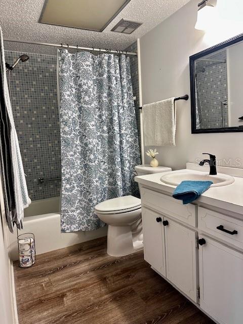 1701 Pinehurst Road, Unit 13C Dunedin, FL 34698 - Photo 16 of 28 a bathroom with a sink toilet and shower