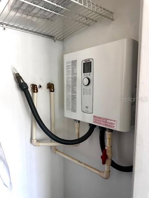 1701 Pinehurst Road, Unit 13C Dunedin, FL 34698 - Photo 17 of 28 a room with gym equipment