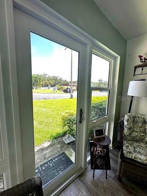 1701 Pinehurst Road, Unit 13C Dunedin, FL 34698 - Photo 20 of 28 a view of living room with furniture and floor to ceiling windows